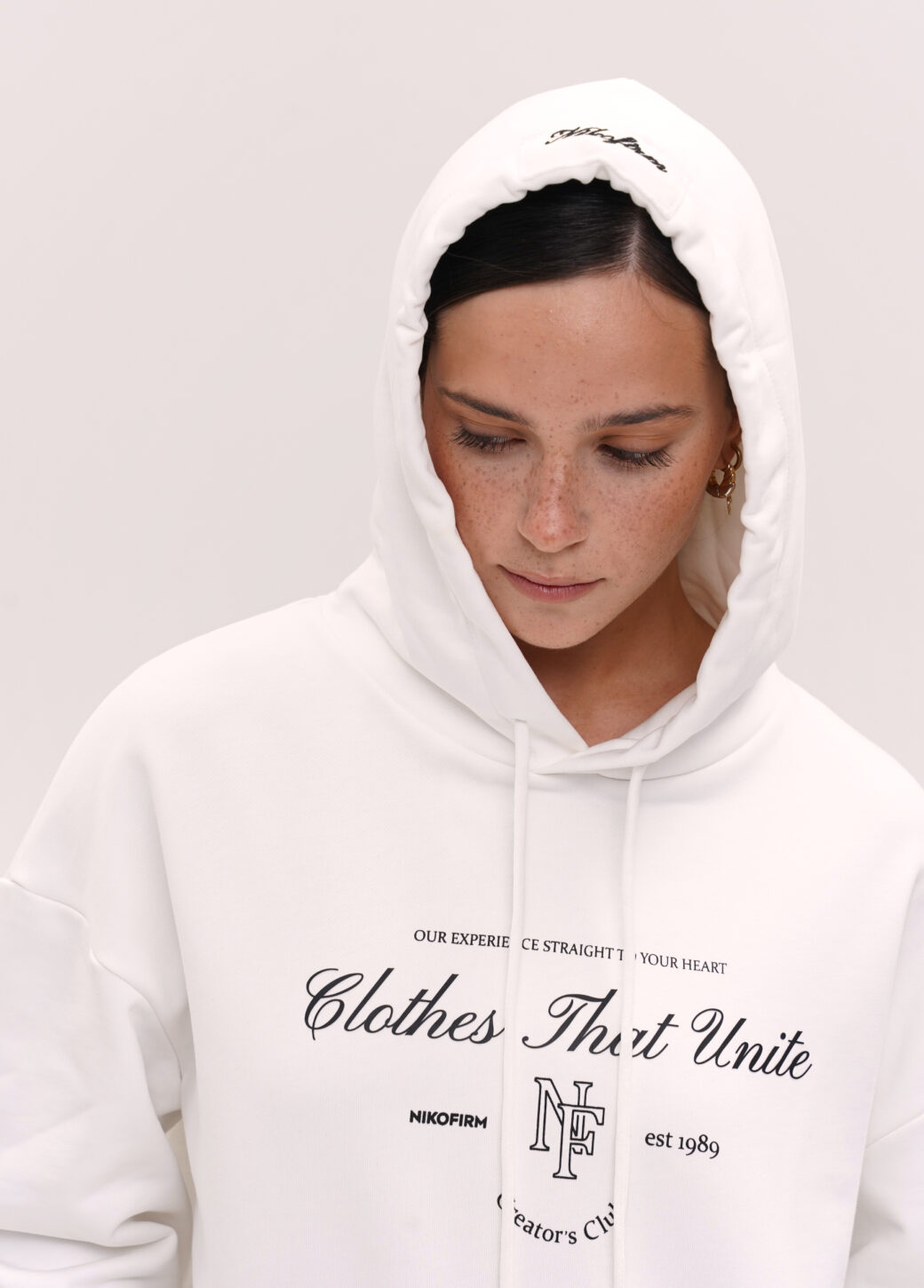 White hoodie NIKOFIRM