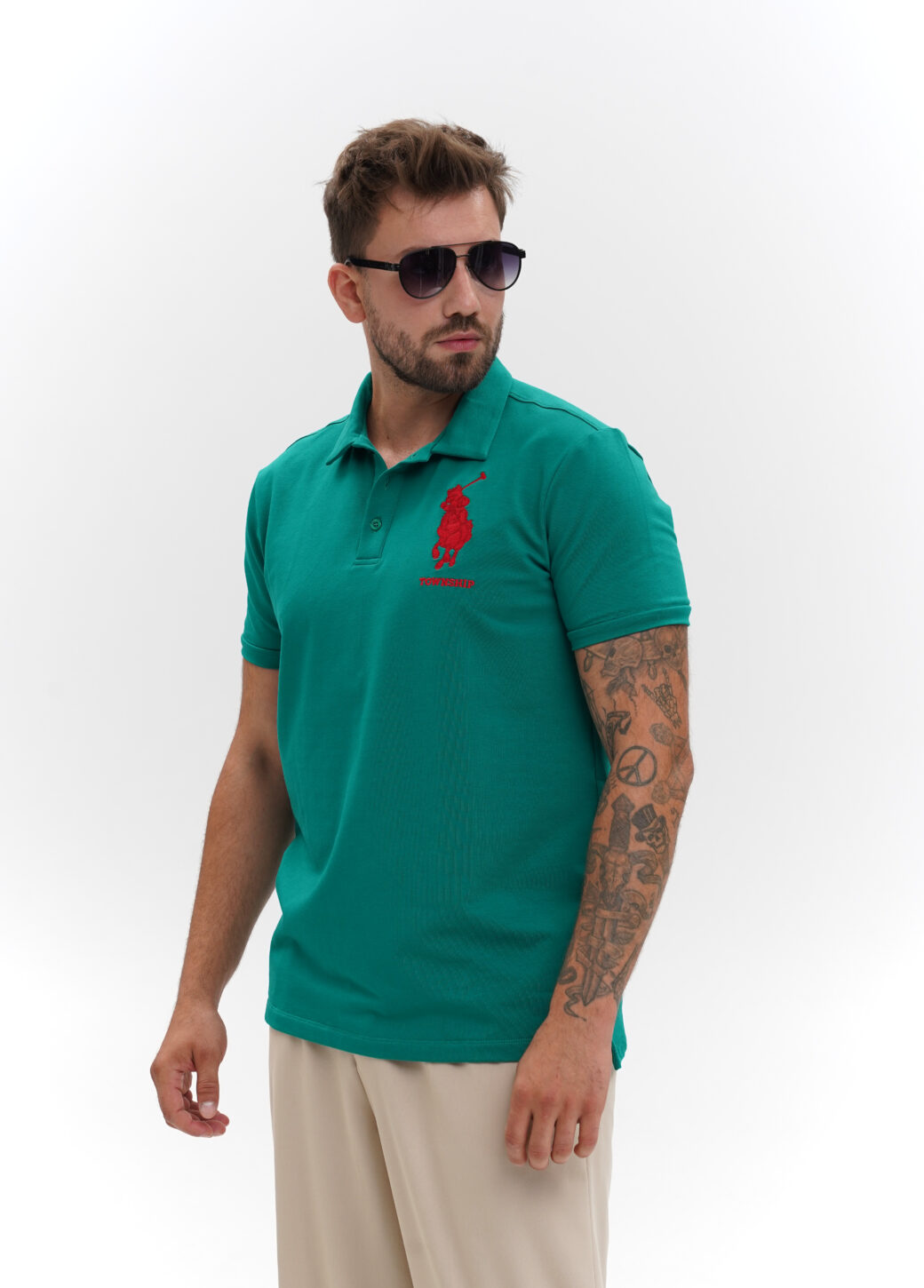 Green polo with embroidery