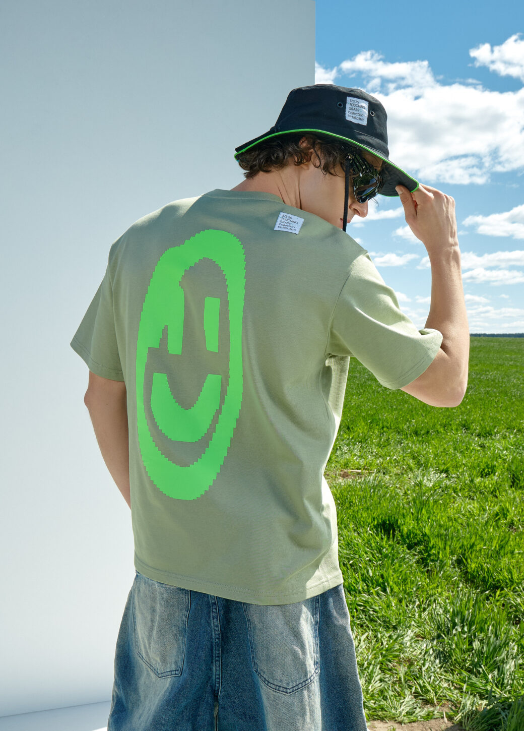 T-shirt TOUCHING GRASS by Nikofirm